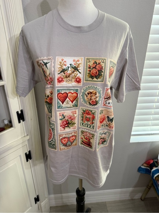 Port and Company Tops - Vintage Stamp Graphic Tee - Light Gray with Floral & Heart Motifs